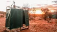 Enjoy a hot shower at our exclusive, semi-permanent eco-camps on the Larapinta Trail |  <i>#cathyfinchphotography</i>