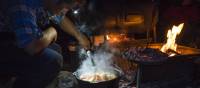 The Larapinta Guides still cook with traditional camp ovens over an open fire | Caroline Crick