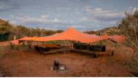 The semi permanent Larapinta Campsites offer comfortable facilities in an outback wilderness |  <i>Caroline Crick</i>